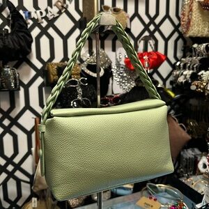 Crossbody handbag with two straps can be handheld